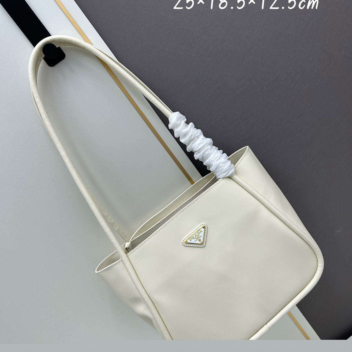 Pra*a top handle bags